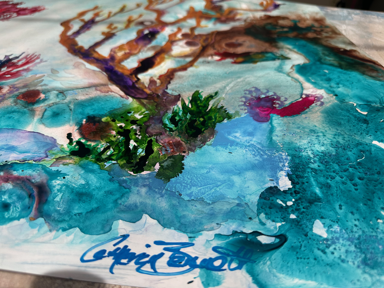 A vibrant underwater scene featuring colorful coral formations and marine life.