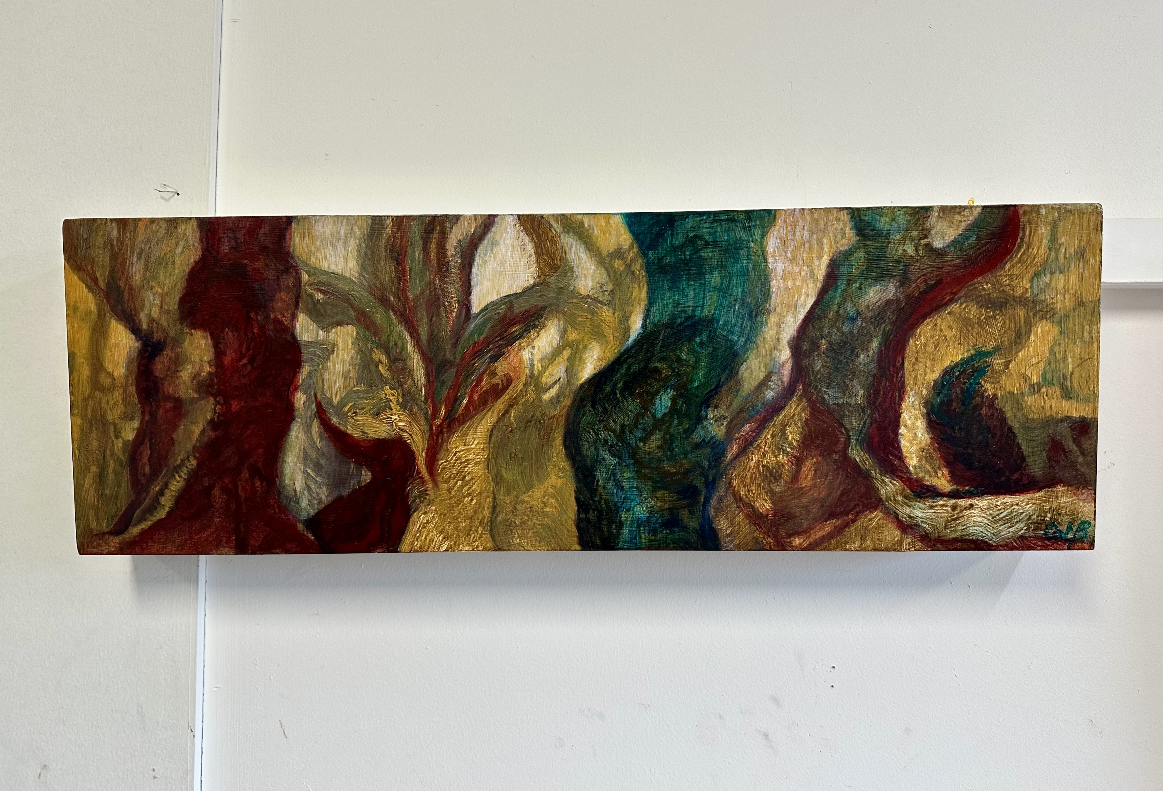 A painting of a group of trees in a forest.