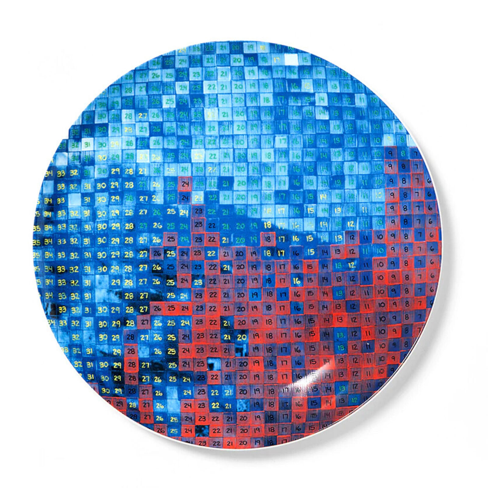 A blue and red plate with a calendar on it.
