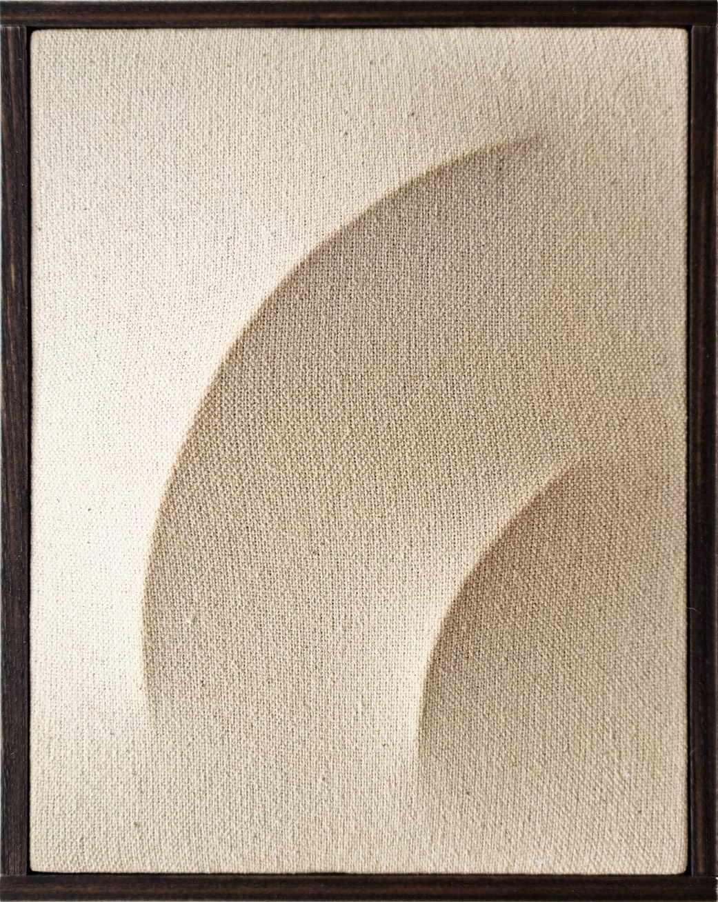 A picture of a painting in a wooden frame on a wall.