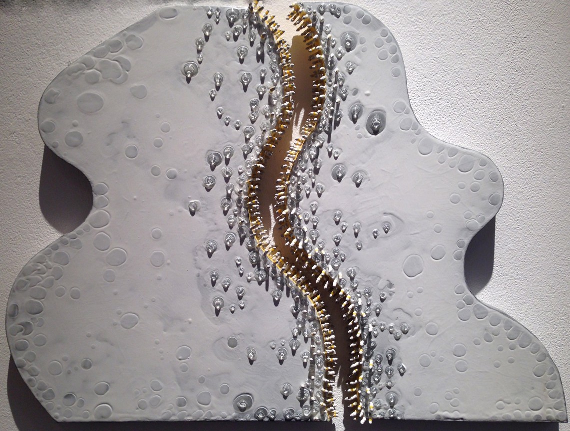 A piece of art that is on a wall.