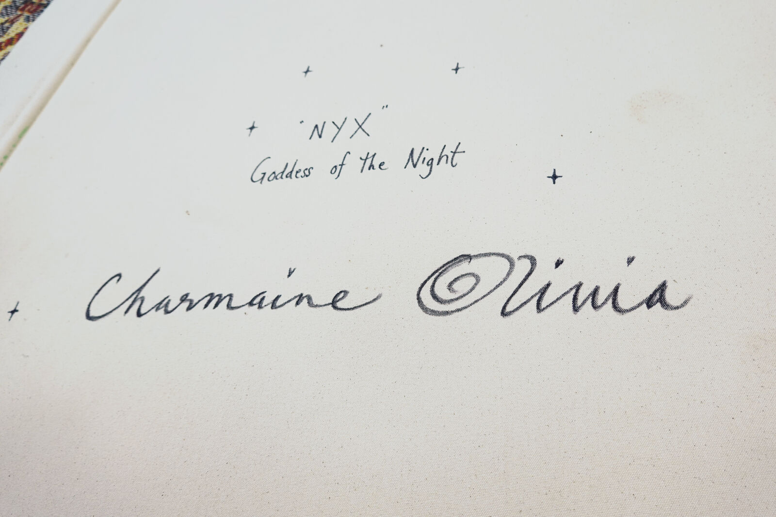 A painting of a woman sitting on a rock with a moon in the background.