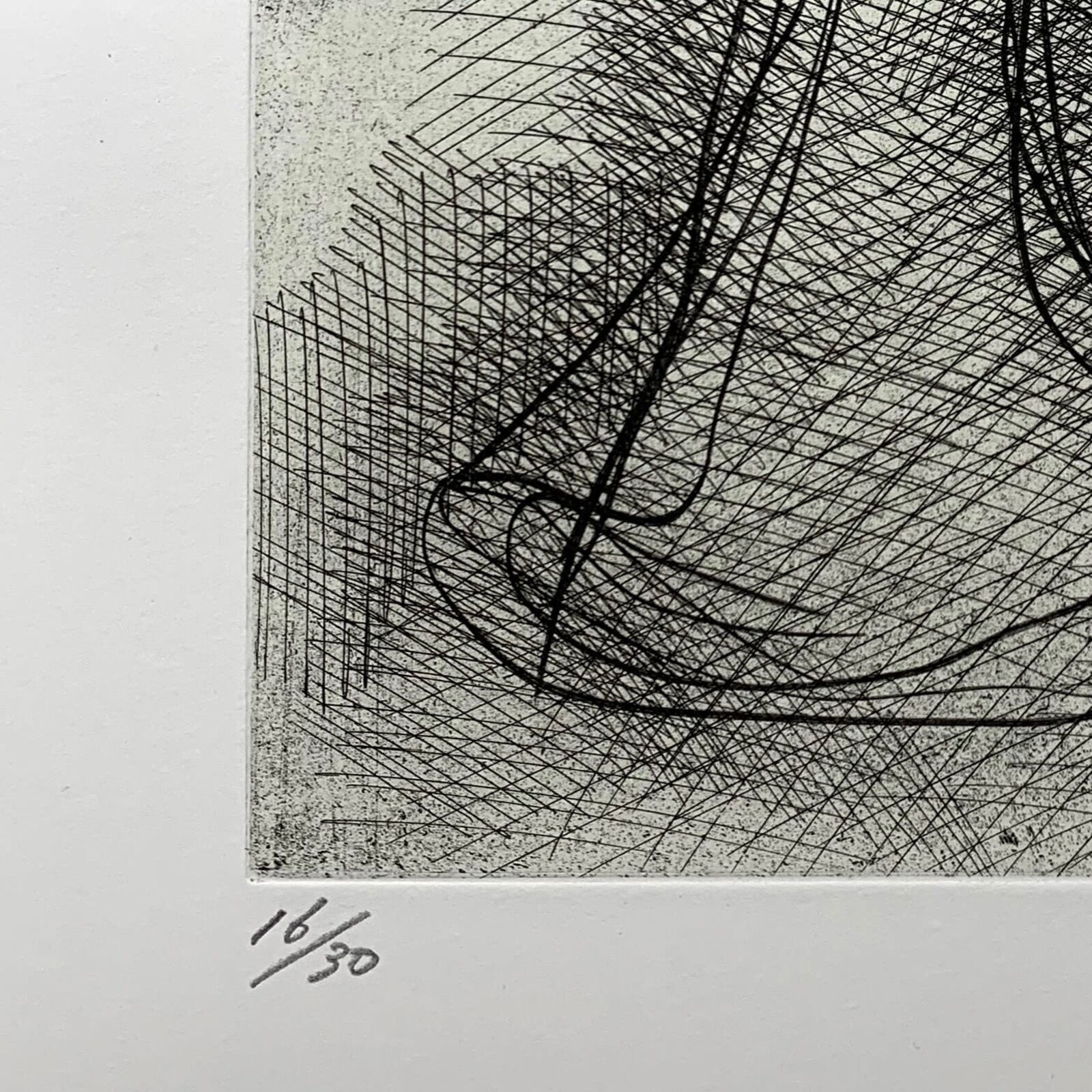 A minimalist framed etching featuring a stylized figure rendered in dense cross-hatching against a stark white background.