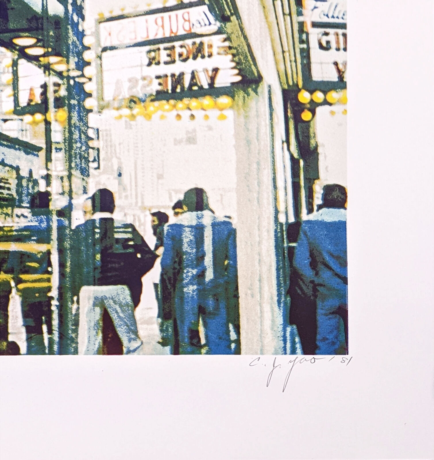 A picture of people walking down a city street at night.
