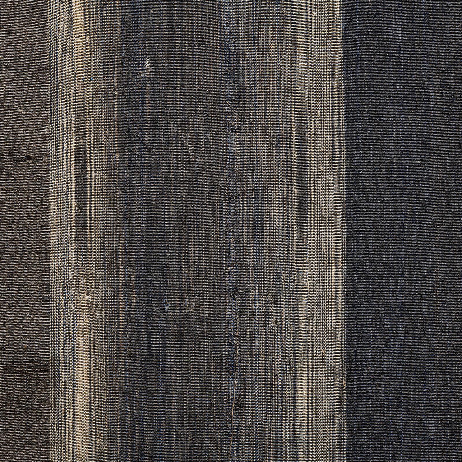 A picture hanging on a wall above a table.