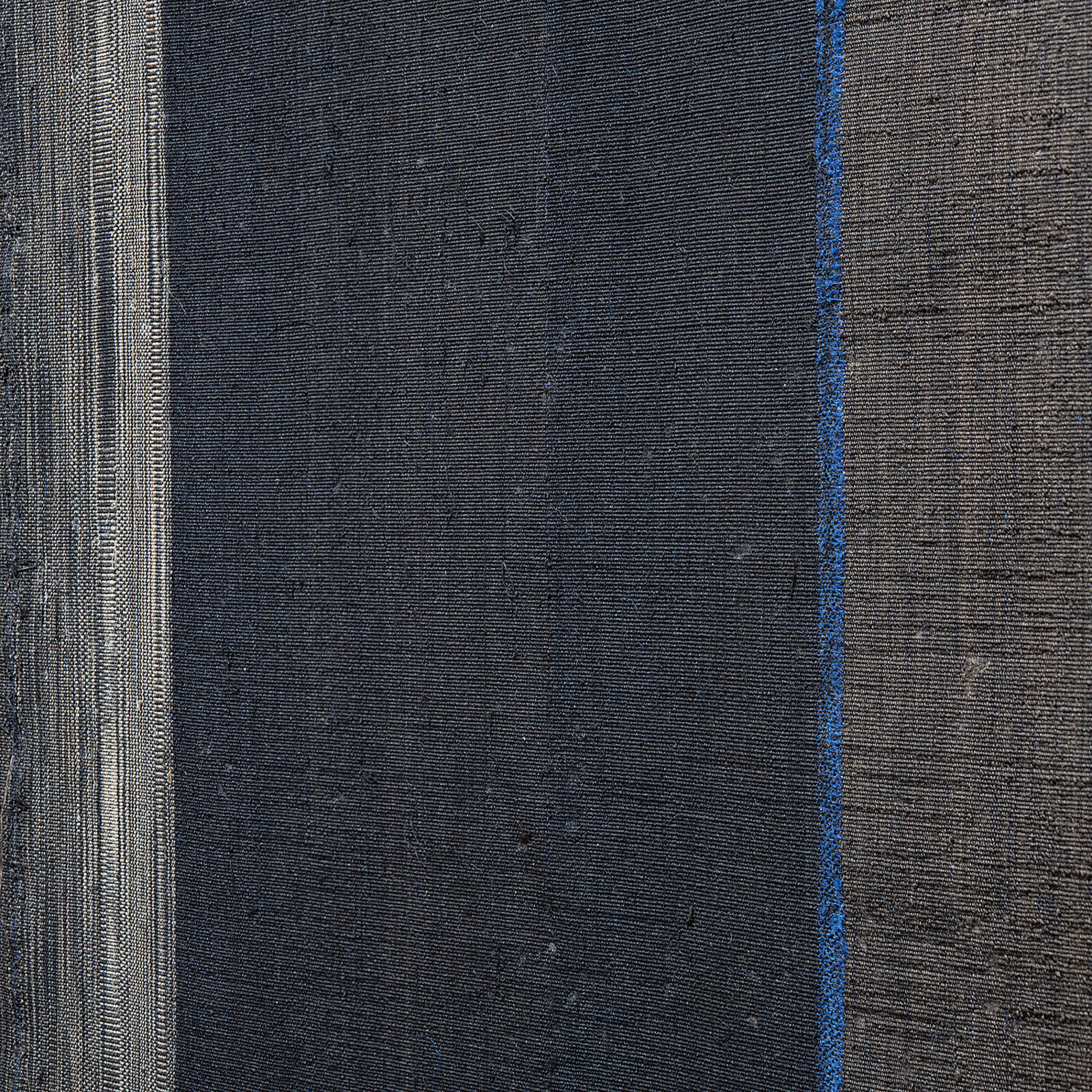 A picture hanging on a wall above a table.