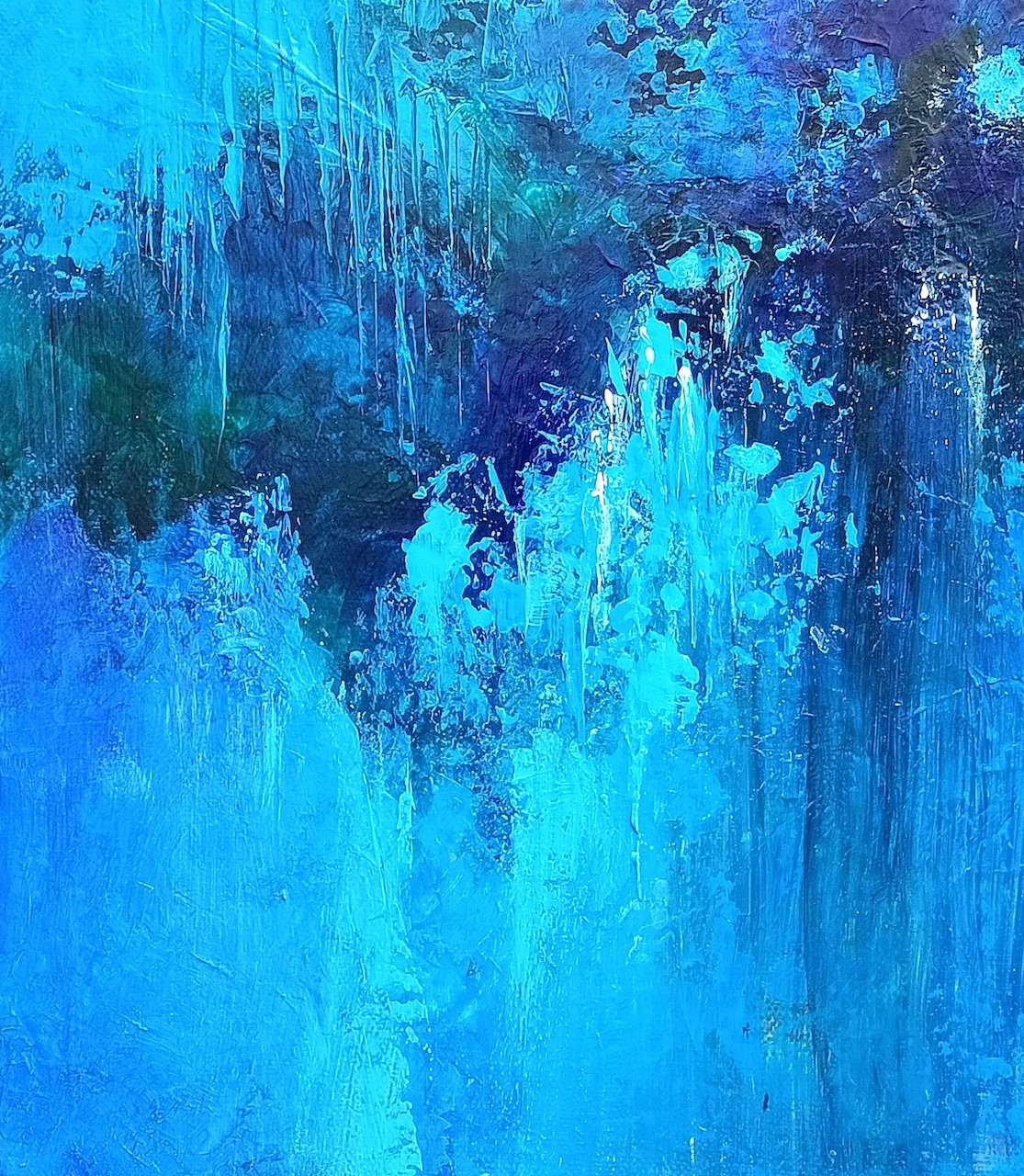 A painting of a blue and purple abstract painting on a wall.