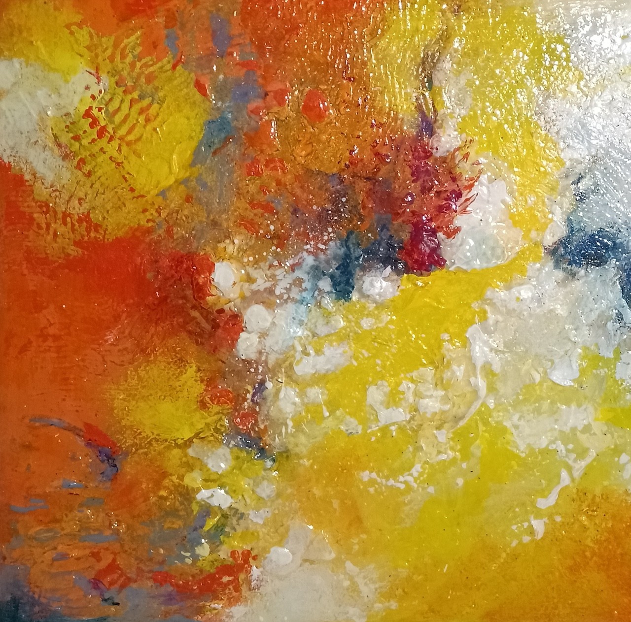 A painting of a yellow, orange, red, and blue abstract painting.