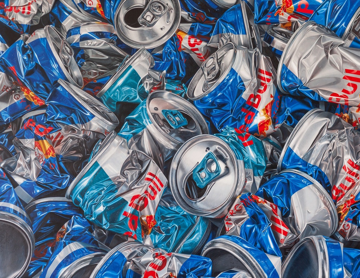 A realistic close-up of crushed aluminum beverage cans piled together.