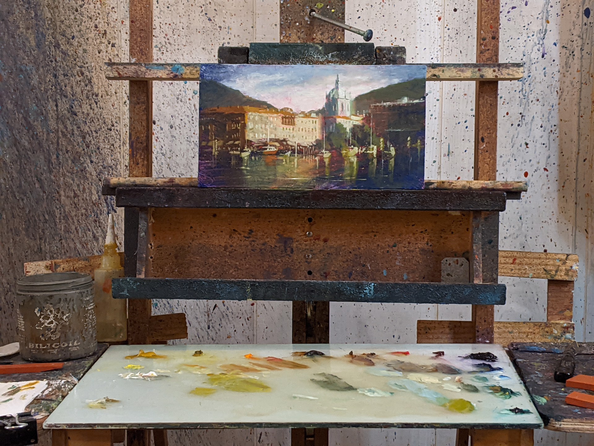 A painting of a cityscape with boats docked in the water.