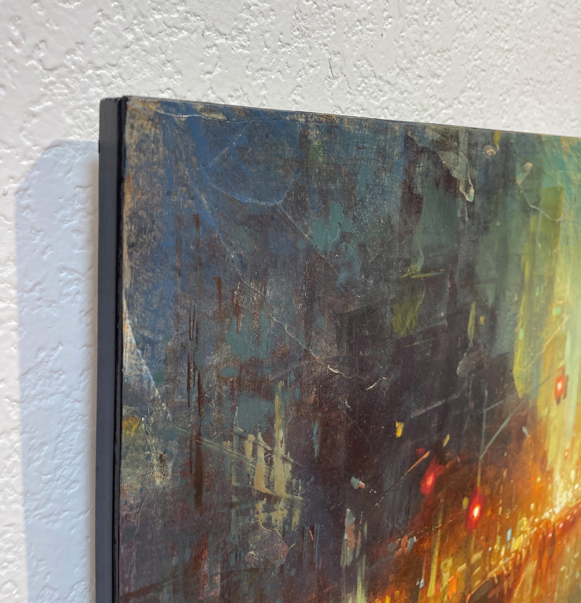 A painting of a city street at night.