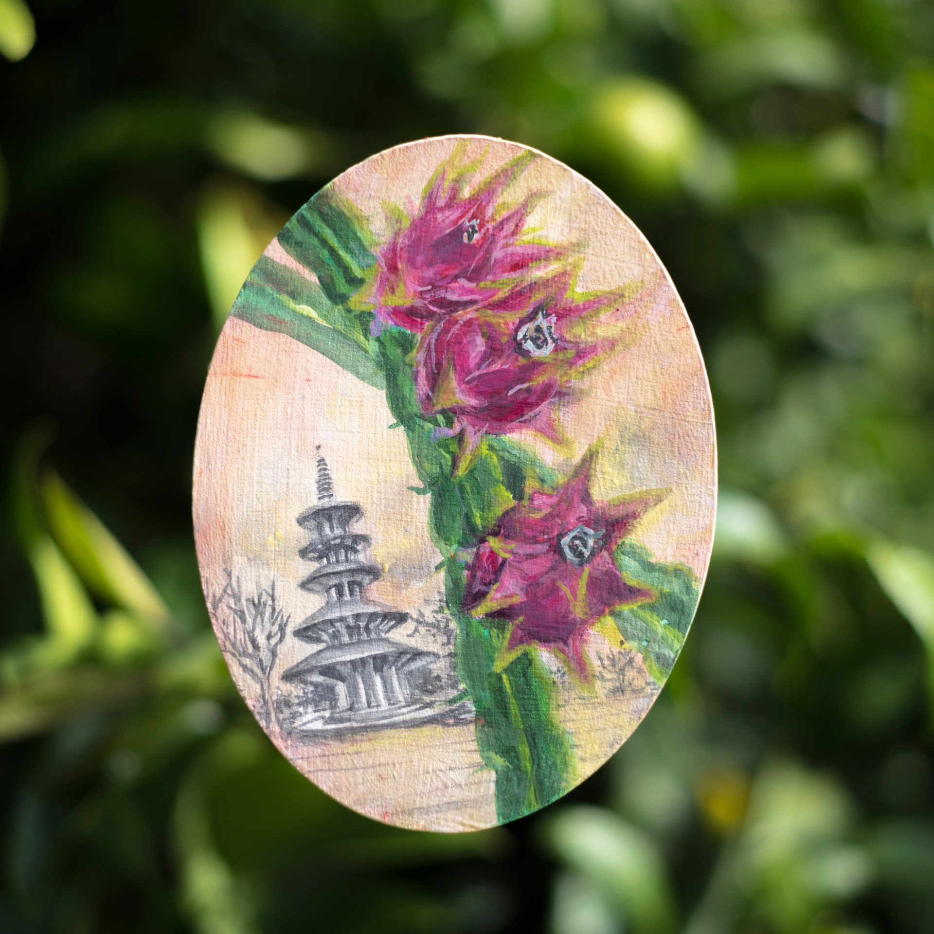 A botanical illustration featuring a dragon fruit and a pagoda.