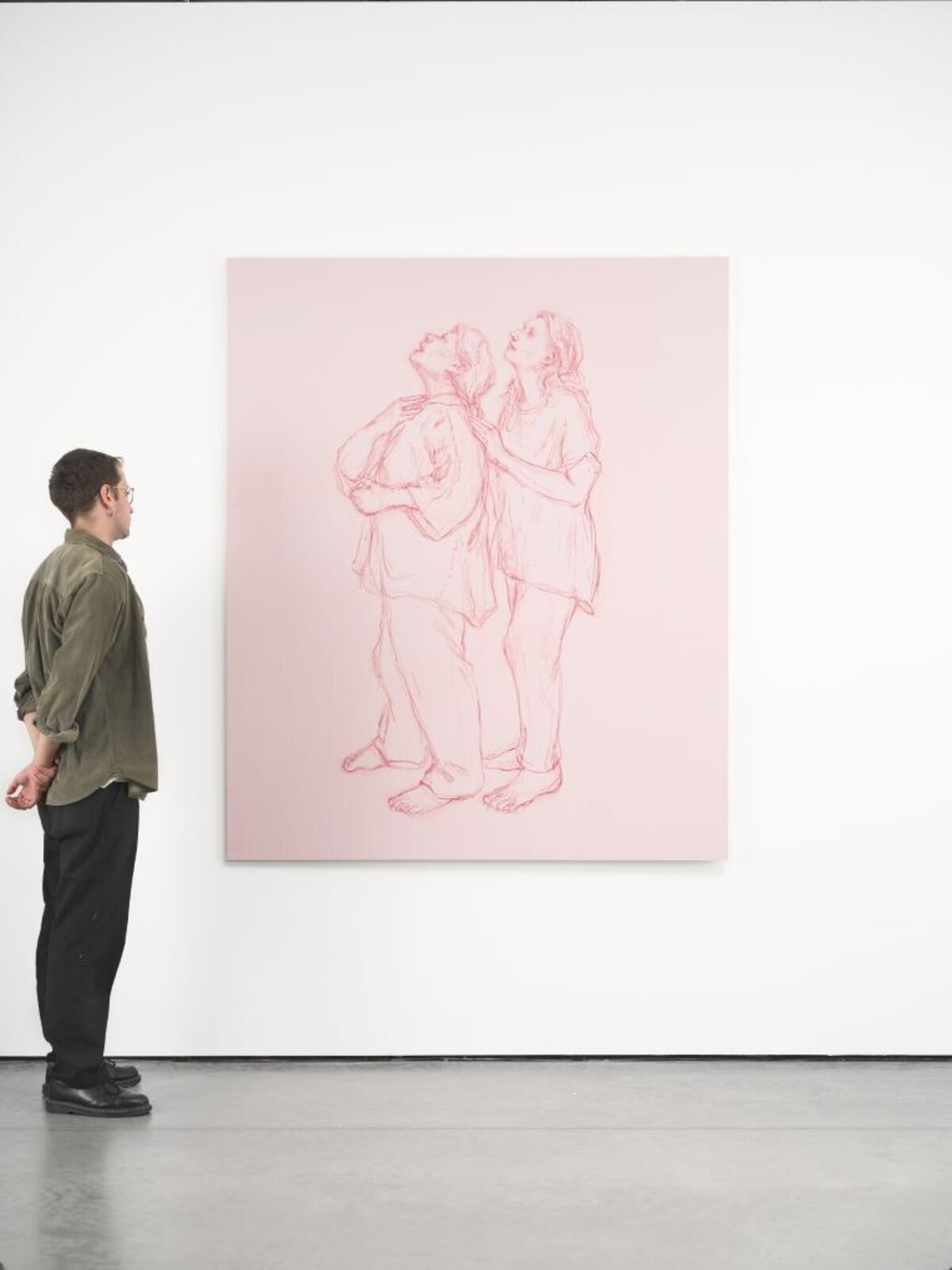 A monochromatic sketch of two figures standing close together, heads tilted upward.