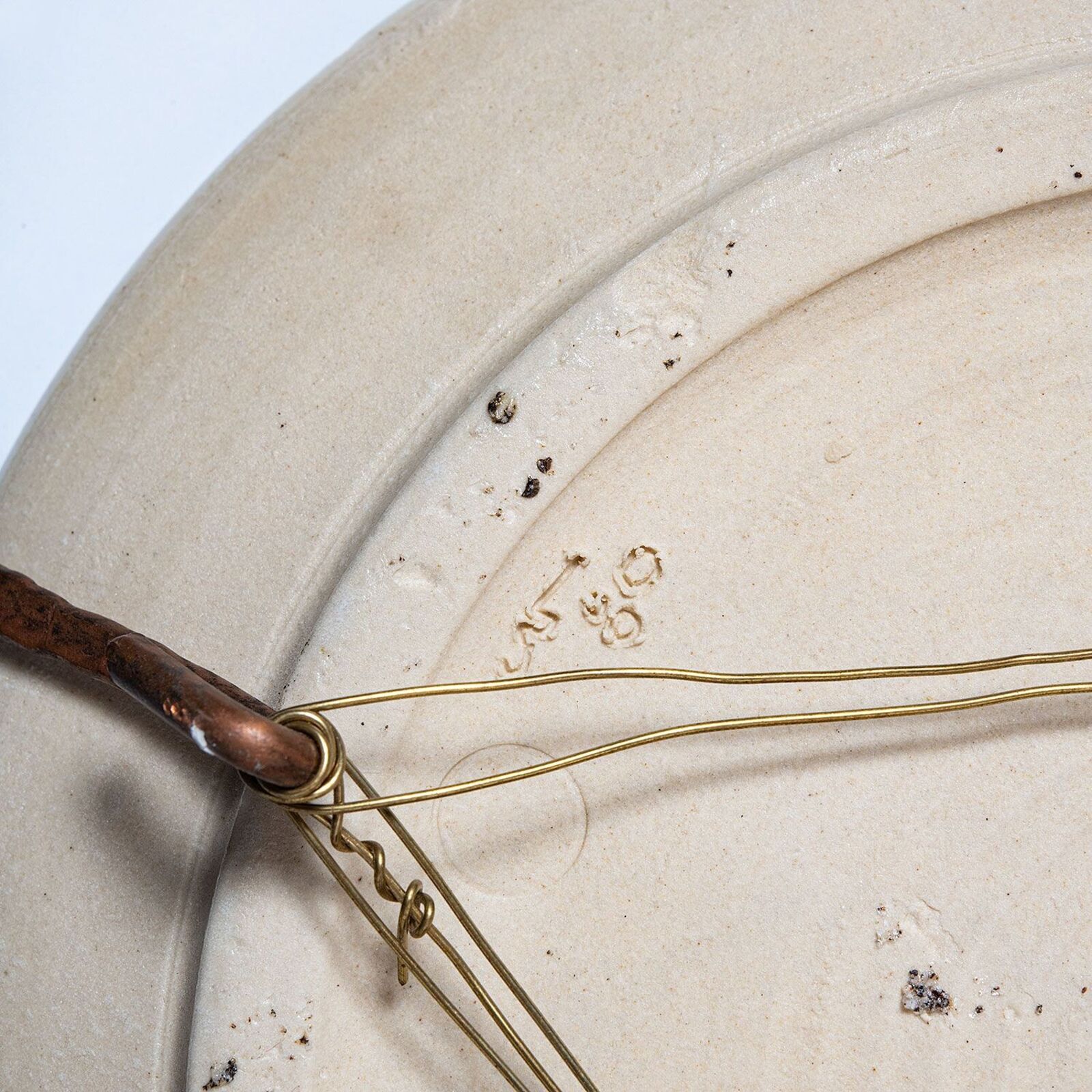 A white plate with a smiley face on it.