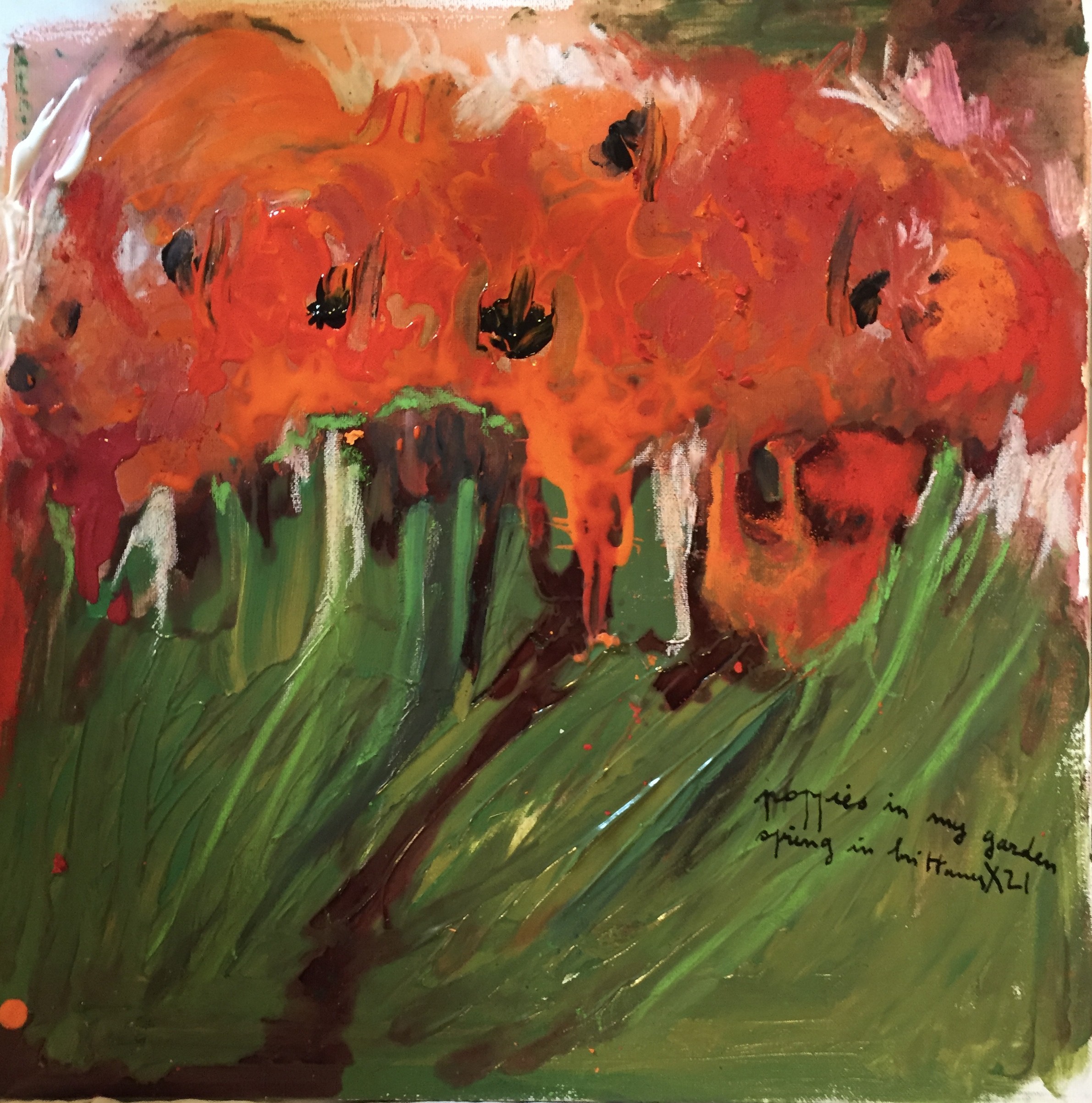 A painting of a field of orange flowers on a green background.