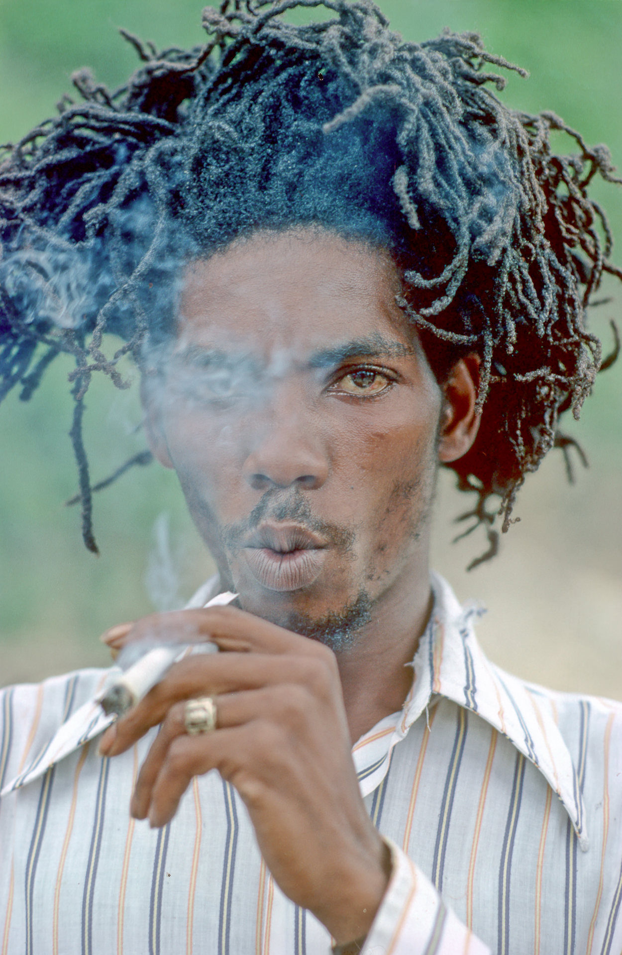 Rasta smoking ganja by Colin Jones, 1978