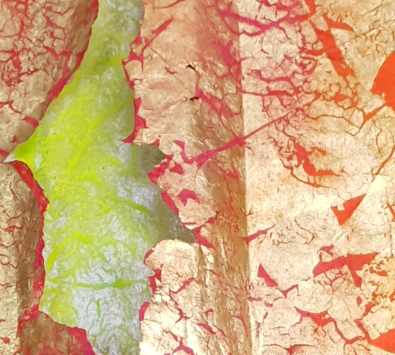 a close up of a leaf on a piece of paper