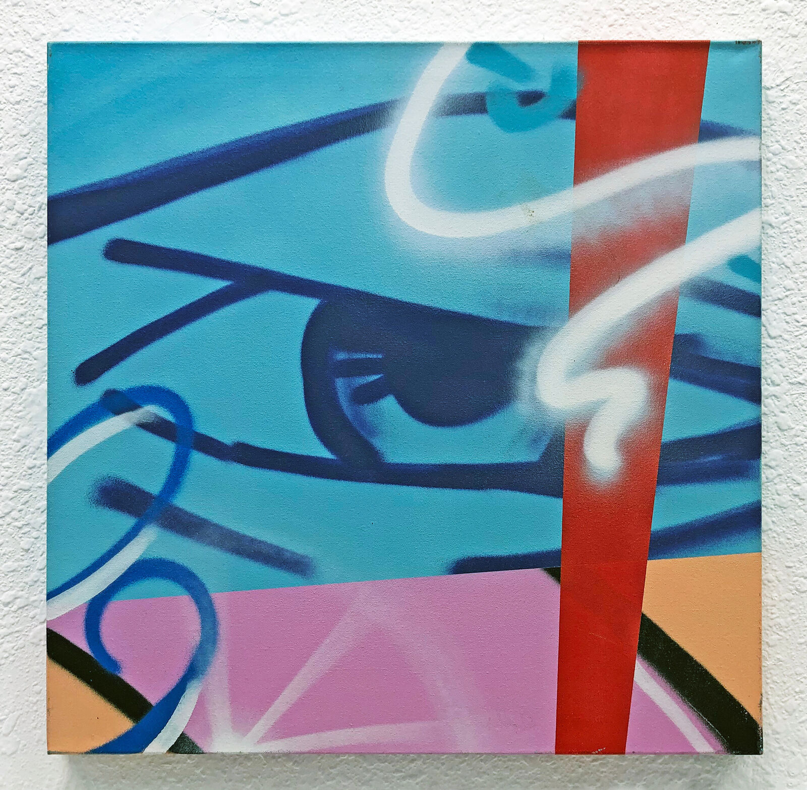 A painting on a wall with graffiti on it. 