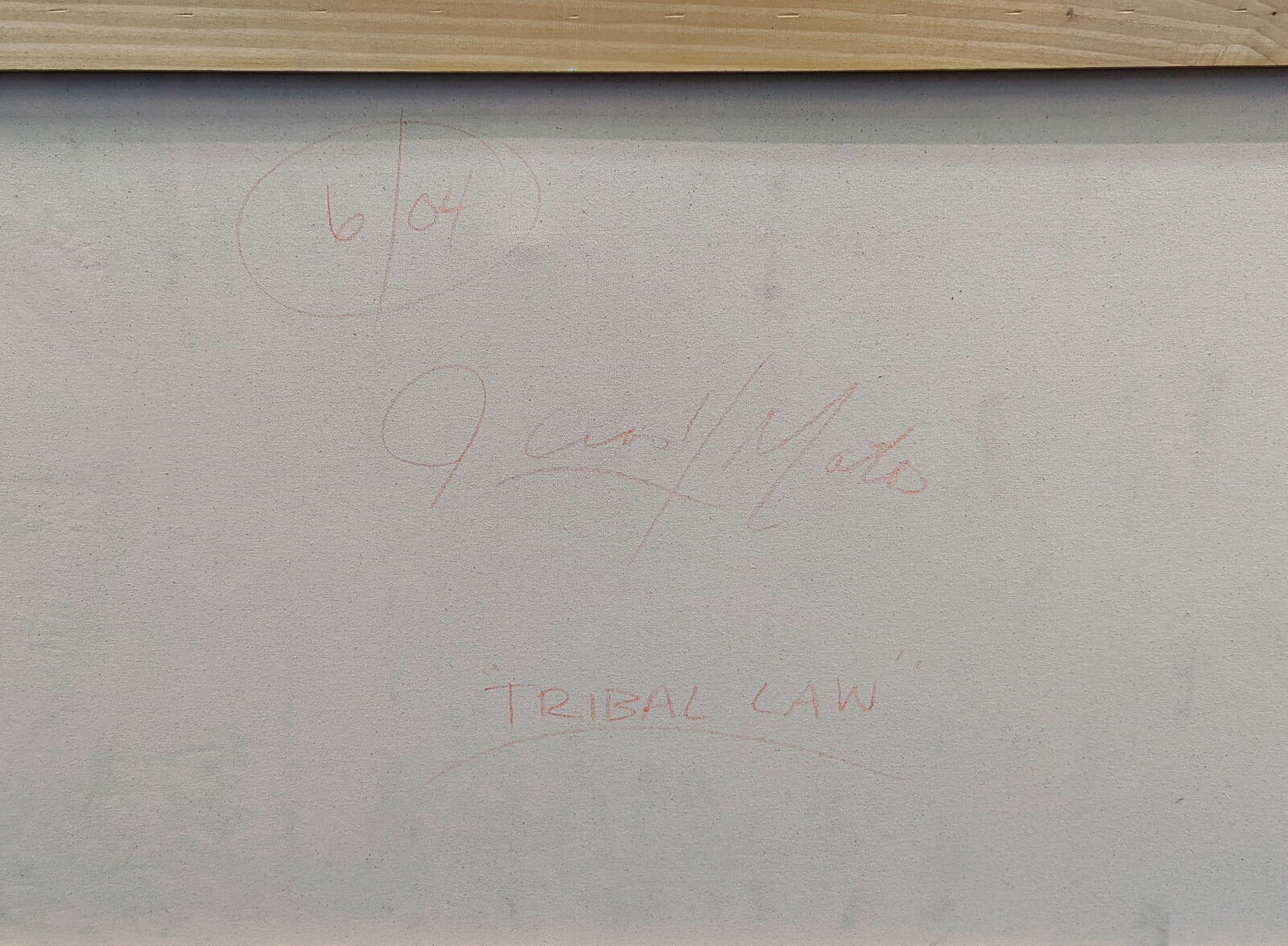 a close up of a painting of a woman's face on a wall