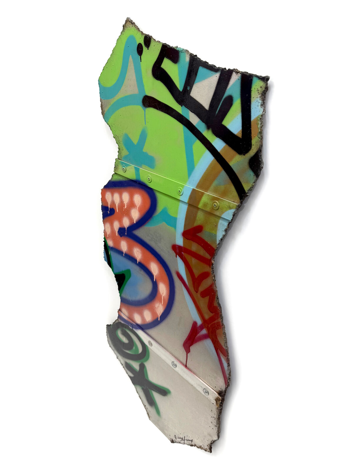 A piece of metal with graffiti on it. 