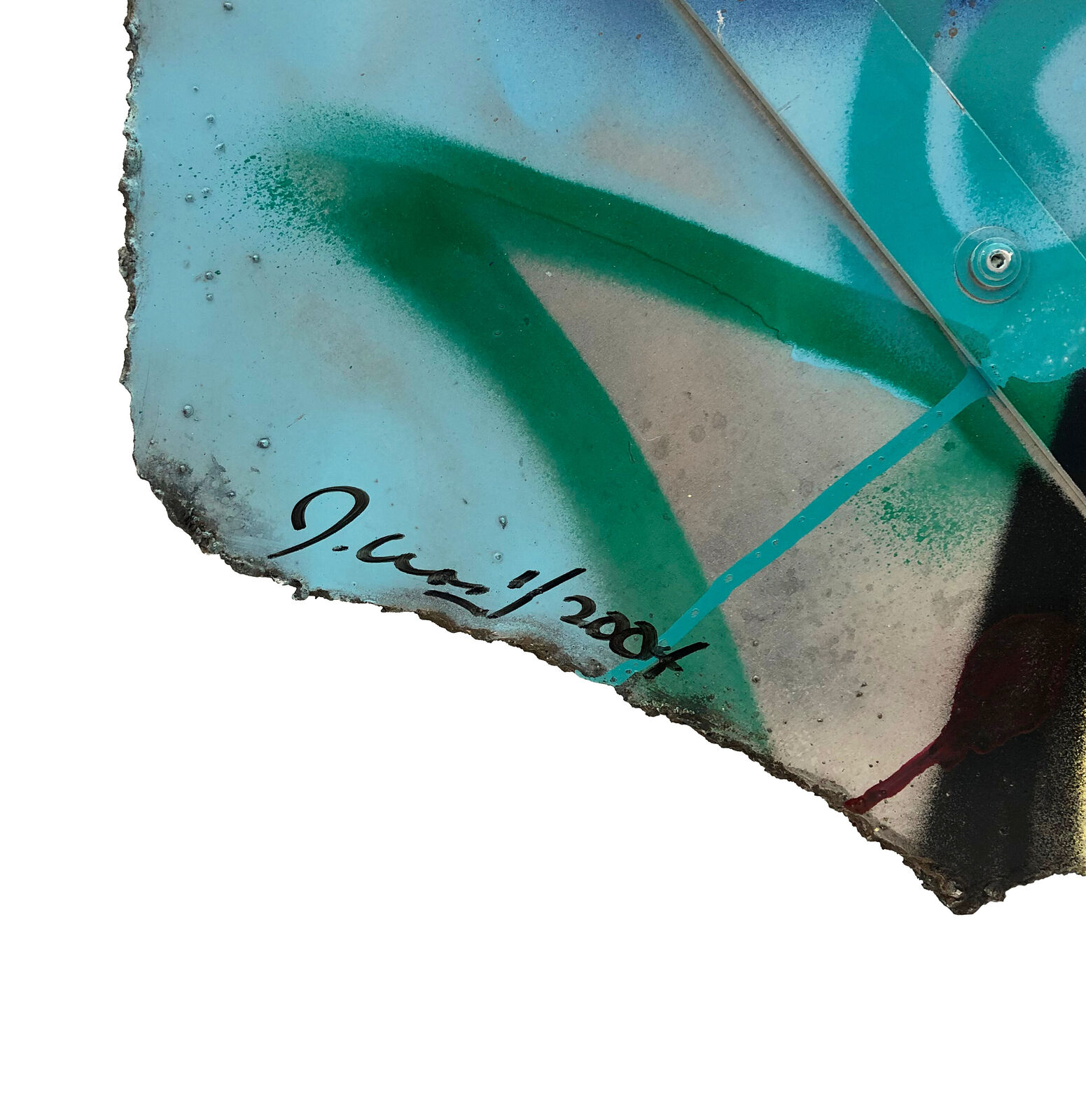 A piece of metal with graffiti on it. 