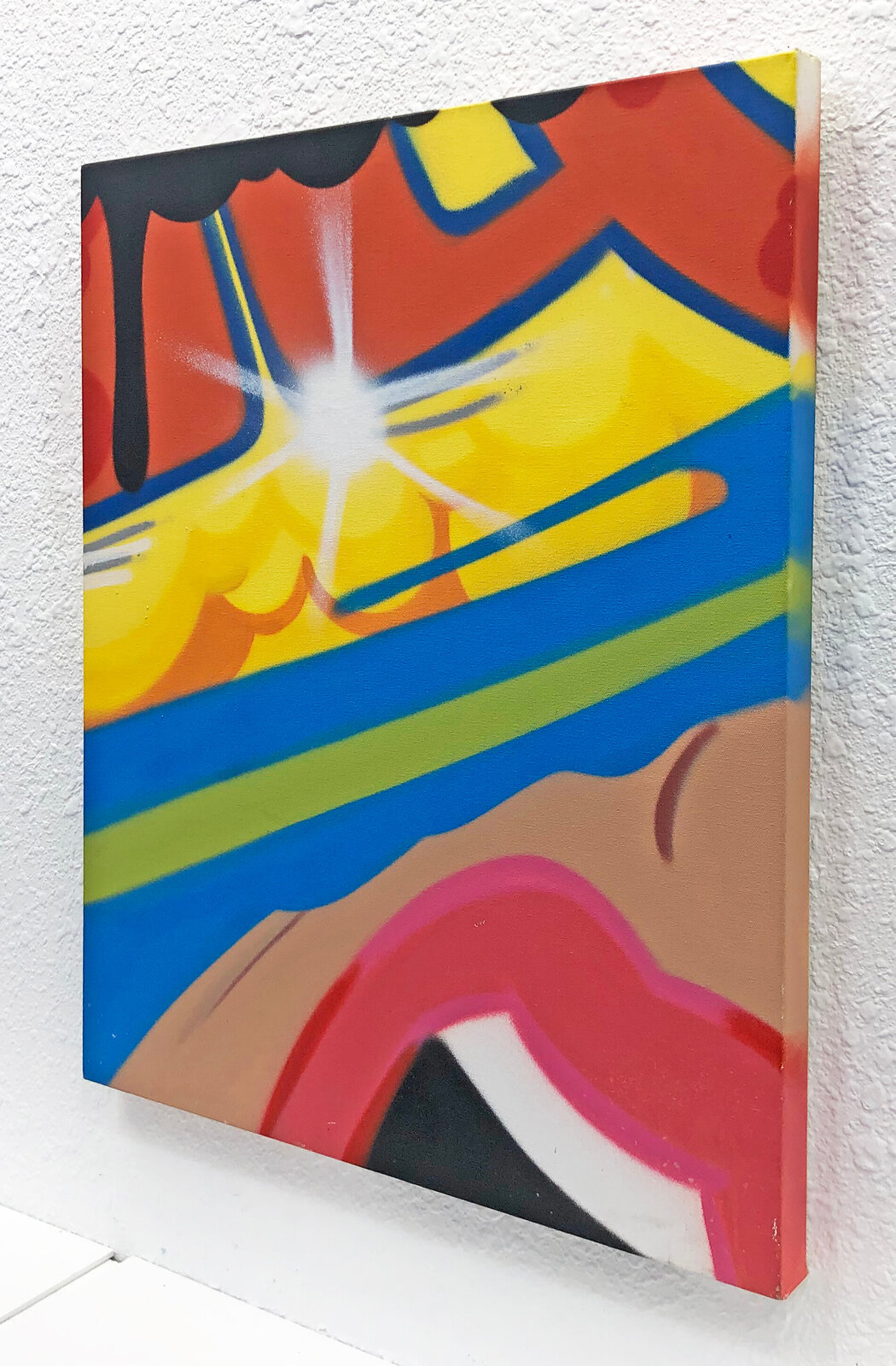 A painting on a white wall with a sun in the background.