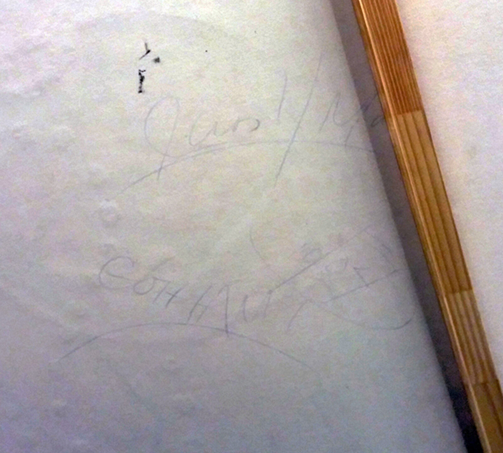 A painting of a colorful abstract painting on a wall.