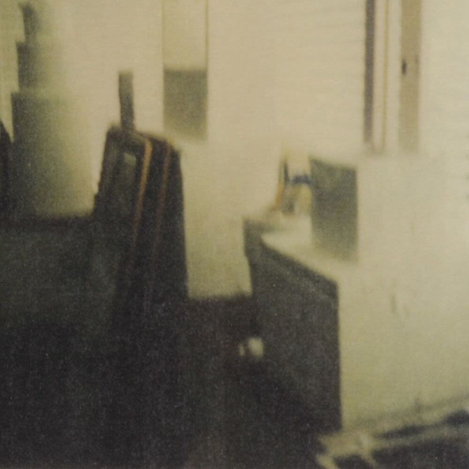 A black and white photo of a room with a white frame.