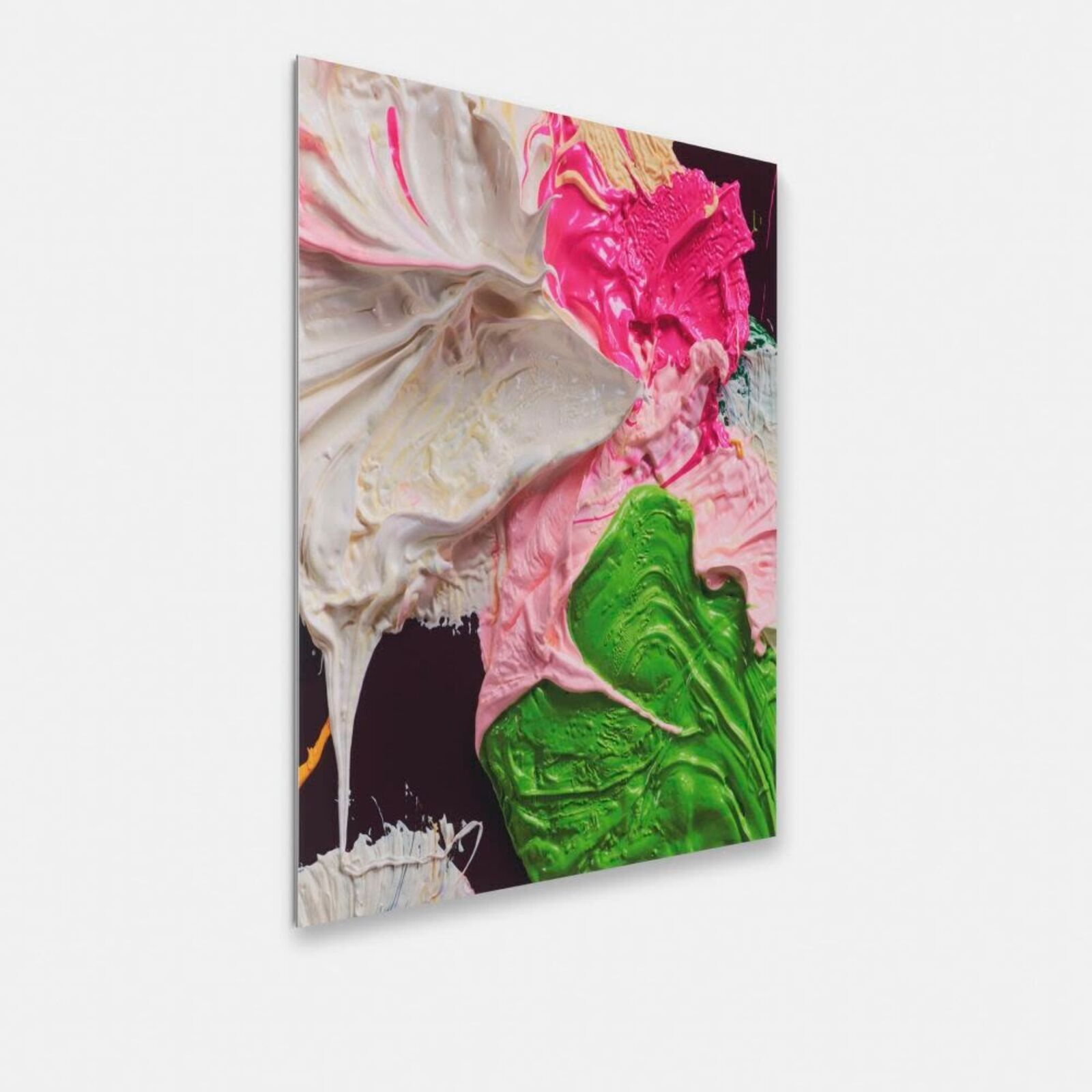 A close up of a painting with pink, green and white paint.