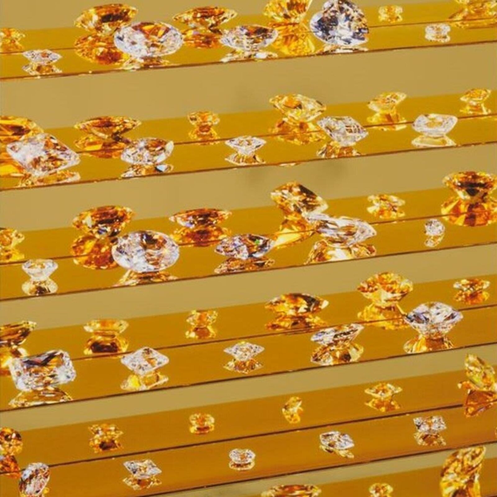 A picture of a gold and white striped wall with diamonds on it.