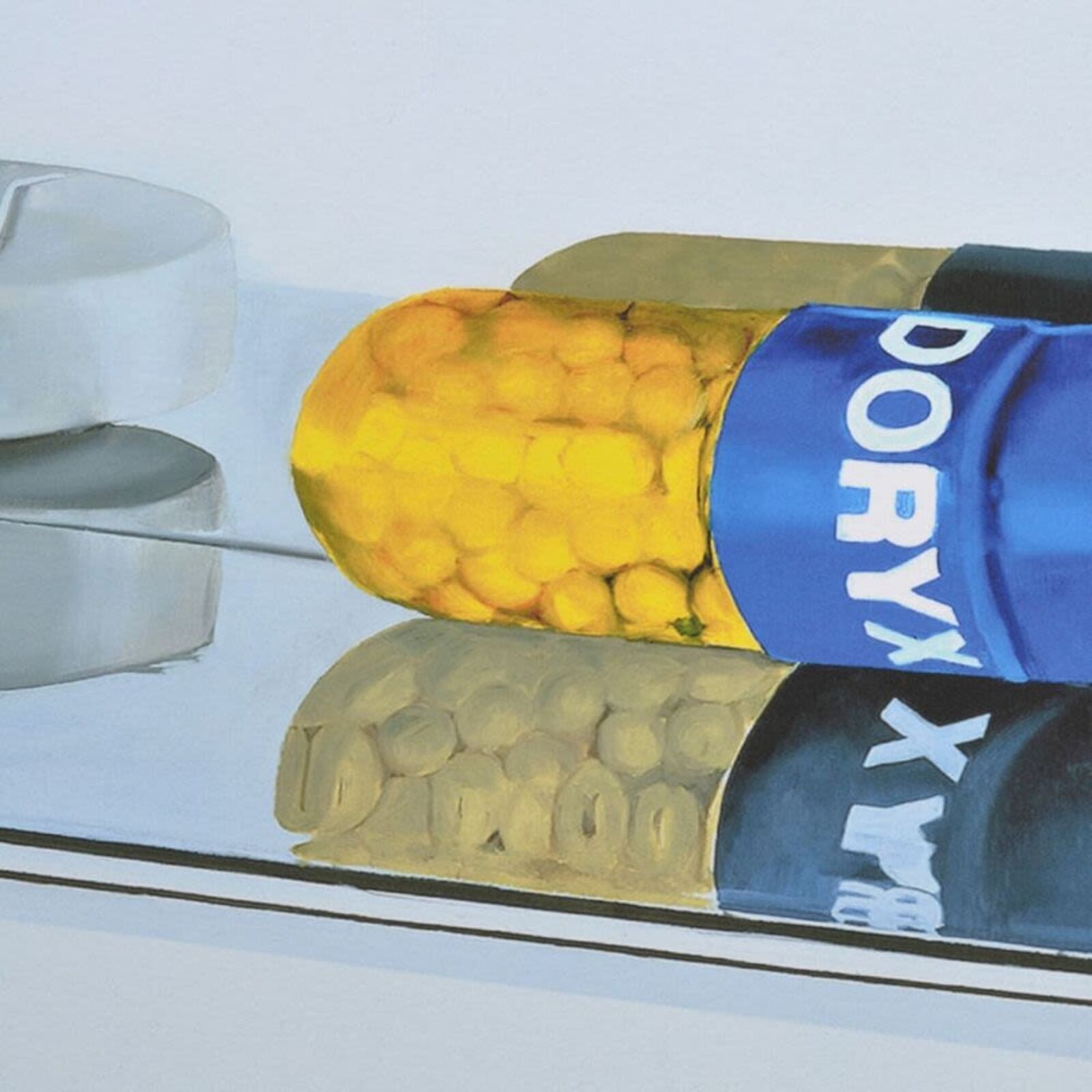 A picture of a shelf filled with lots of different colored pills.