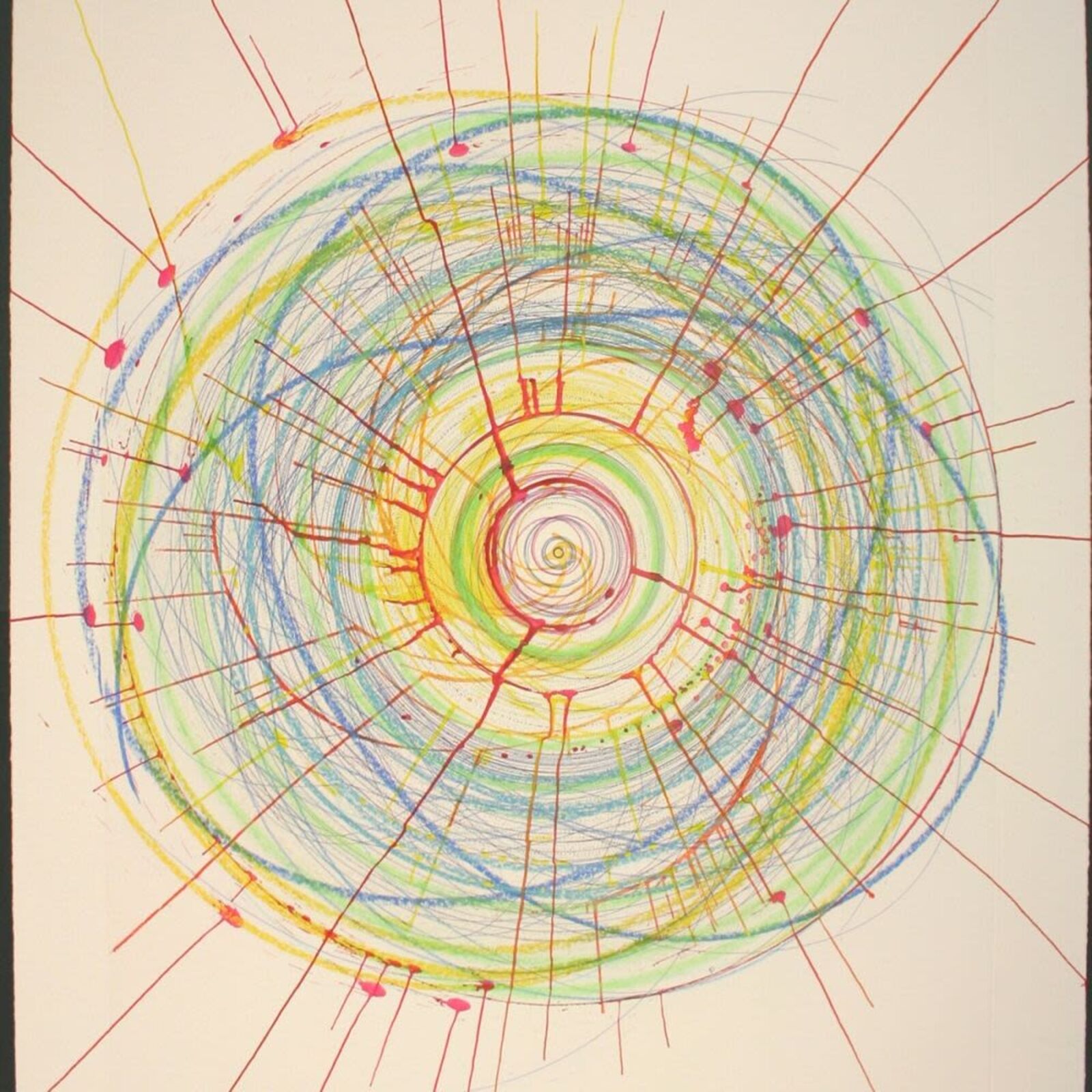 A picture of a drawing of a spiral design on a wall.