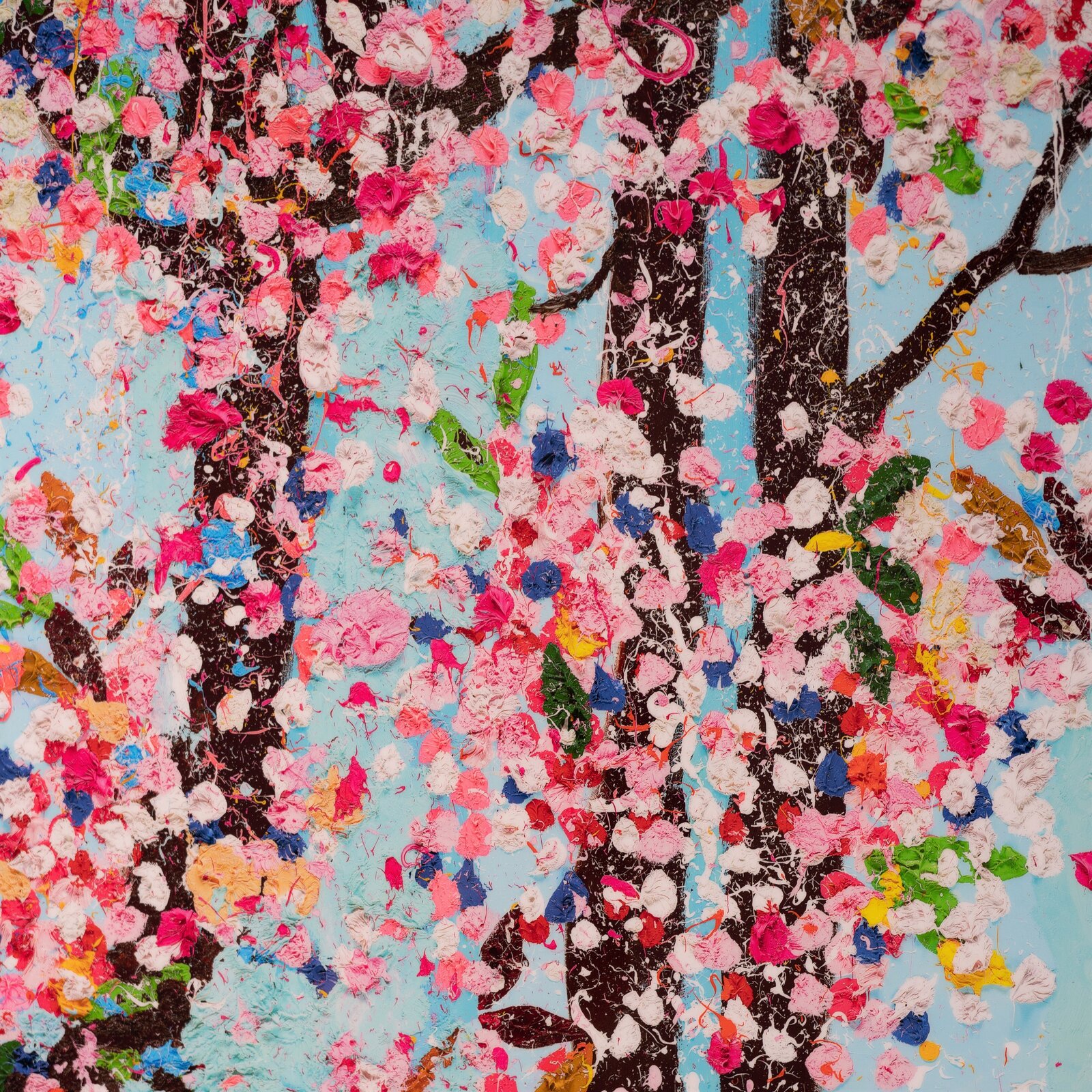 A colorful, textured painting of blooming trees against a light blue sky.