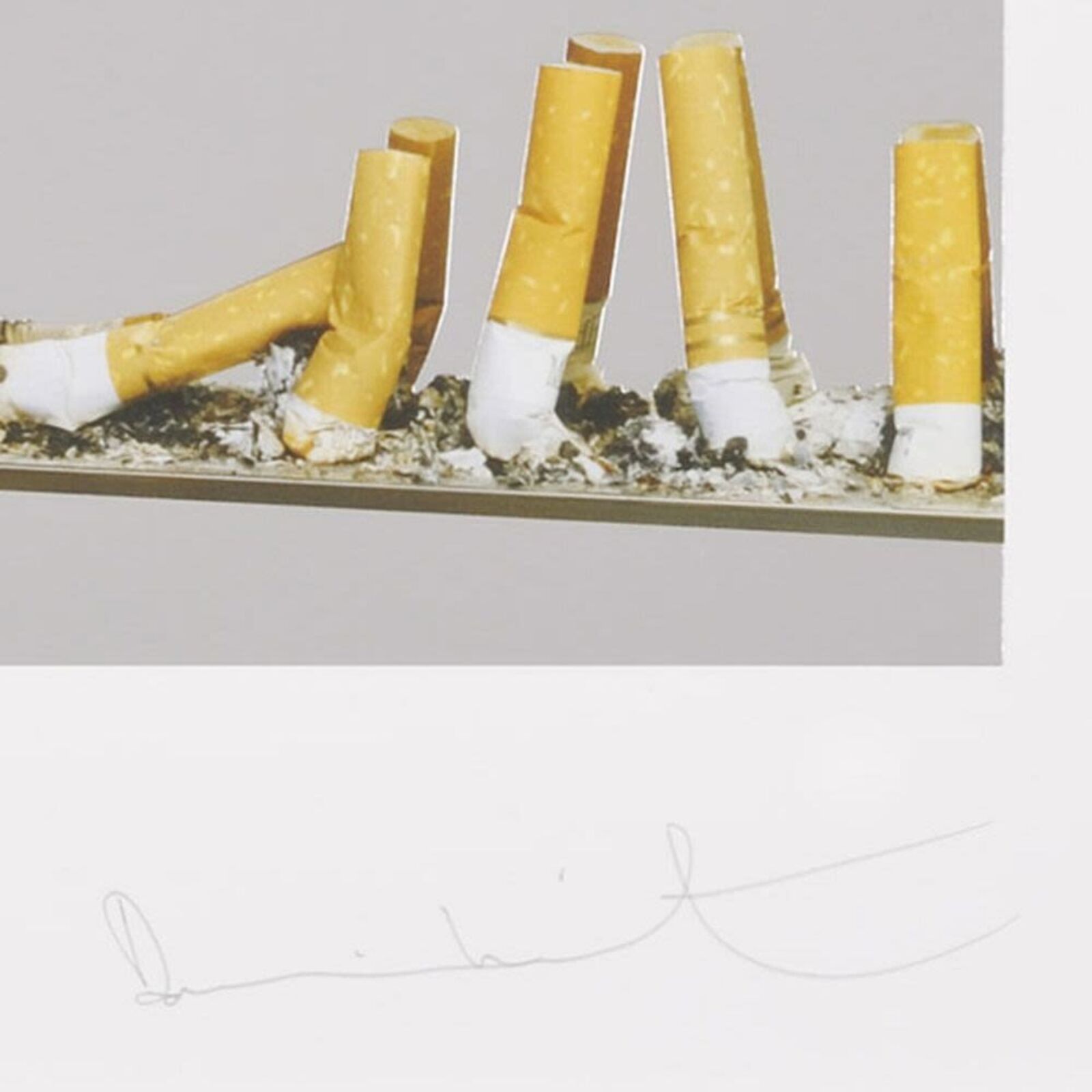 A picture of a shelf of cigarettes on a wall.