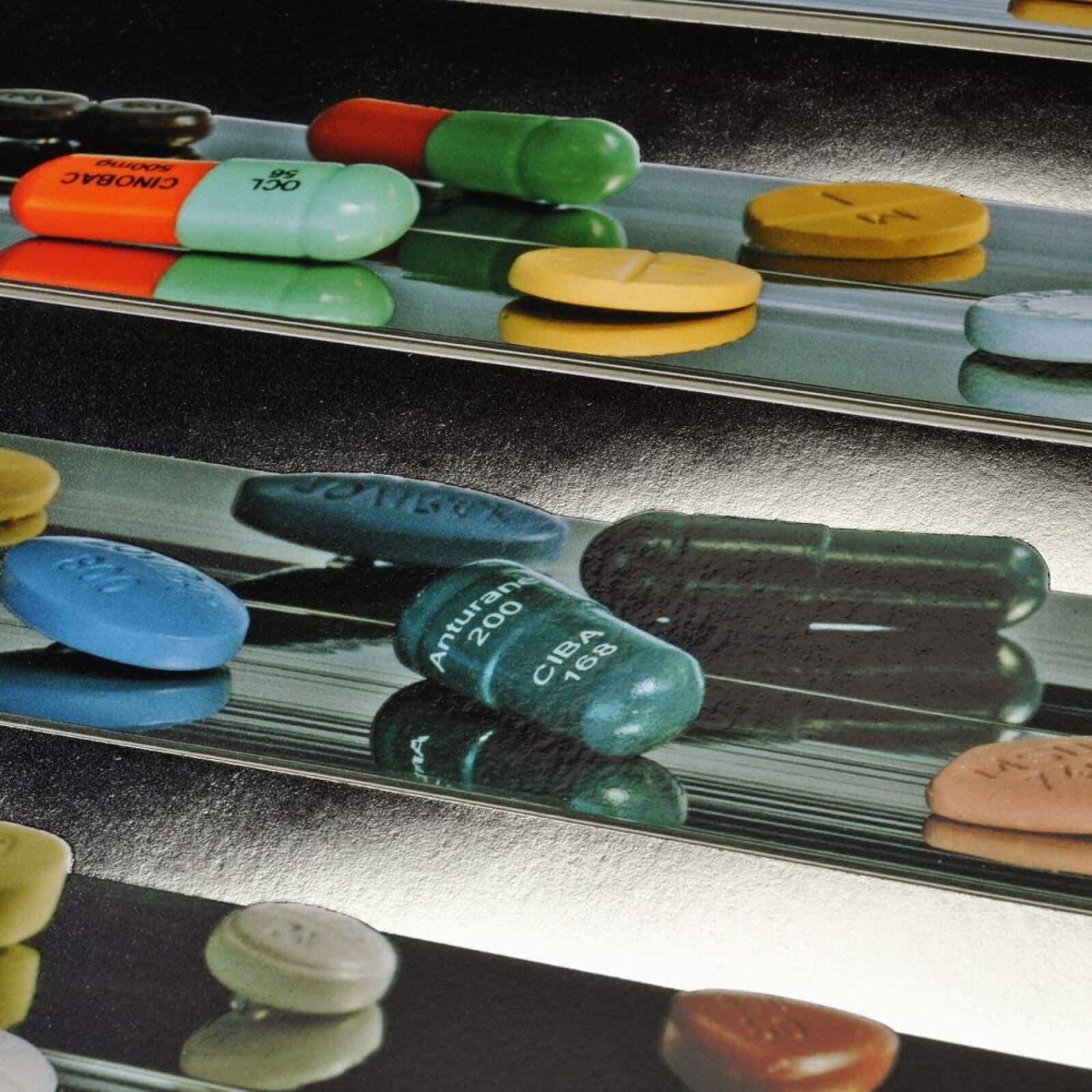 A picture of a white frame hanging on a wall.