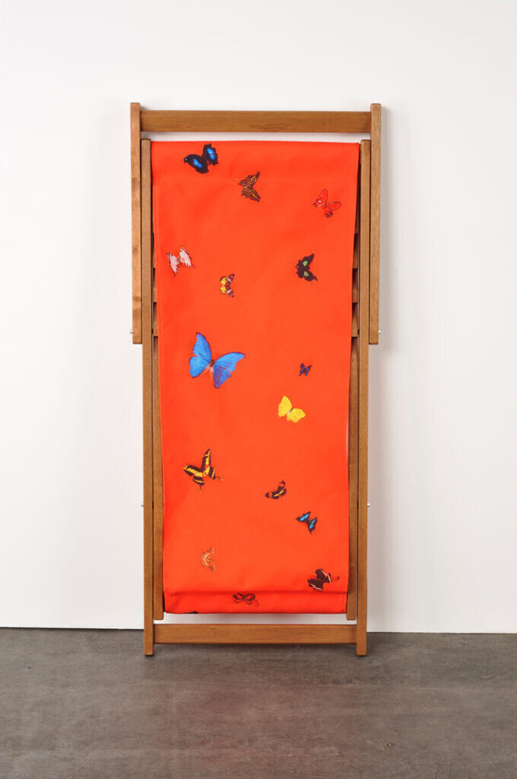Artwork by Damien Hirst, Deck chair (Red), Made of Merpauh timber frame and sail cloth fabric 