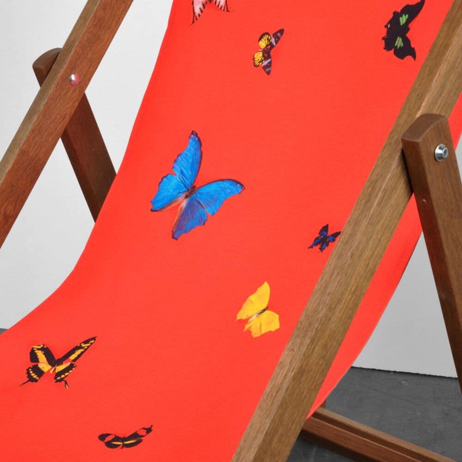 Artwork by Damien Hirst, Deckchair (Red), Made of Merpauh timber frame and sail cloth fabric 