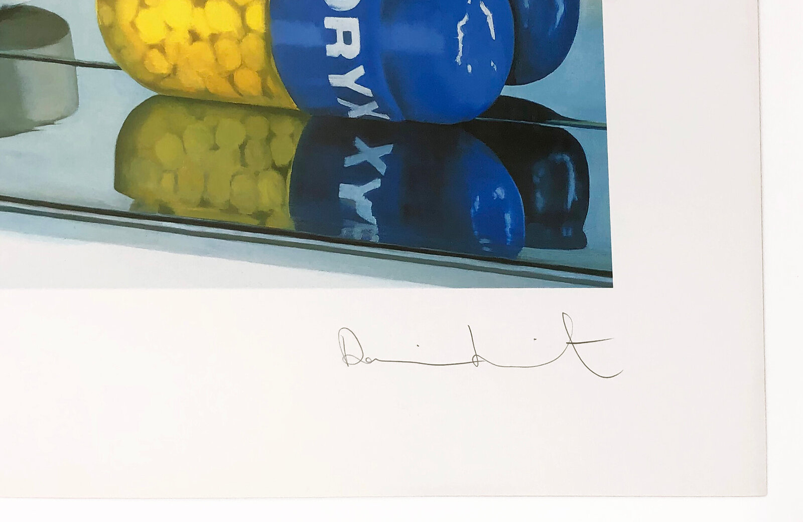 A hyper-realistic still life of colorful pills arranged on reflective glass shelves.