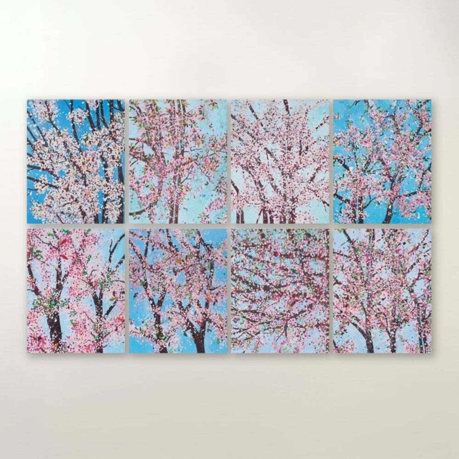 A living room filled with furniture and a large painting.