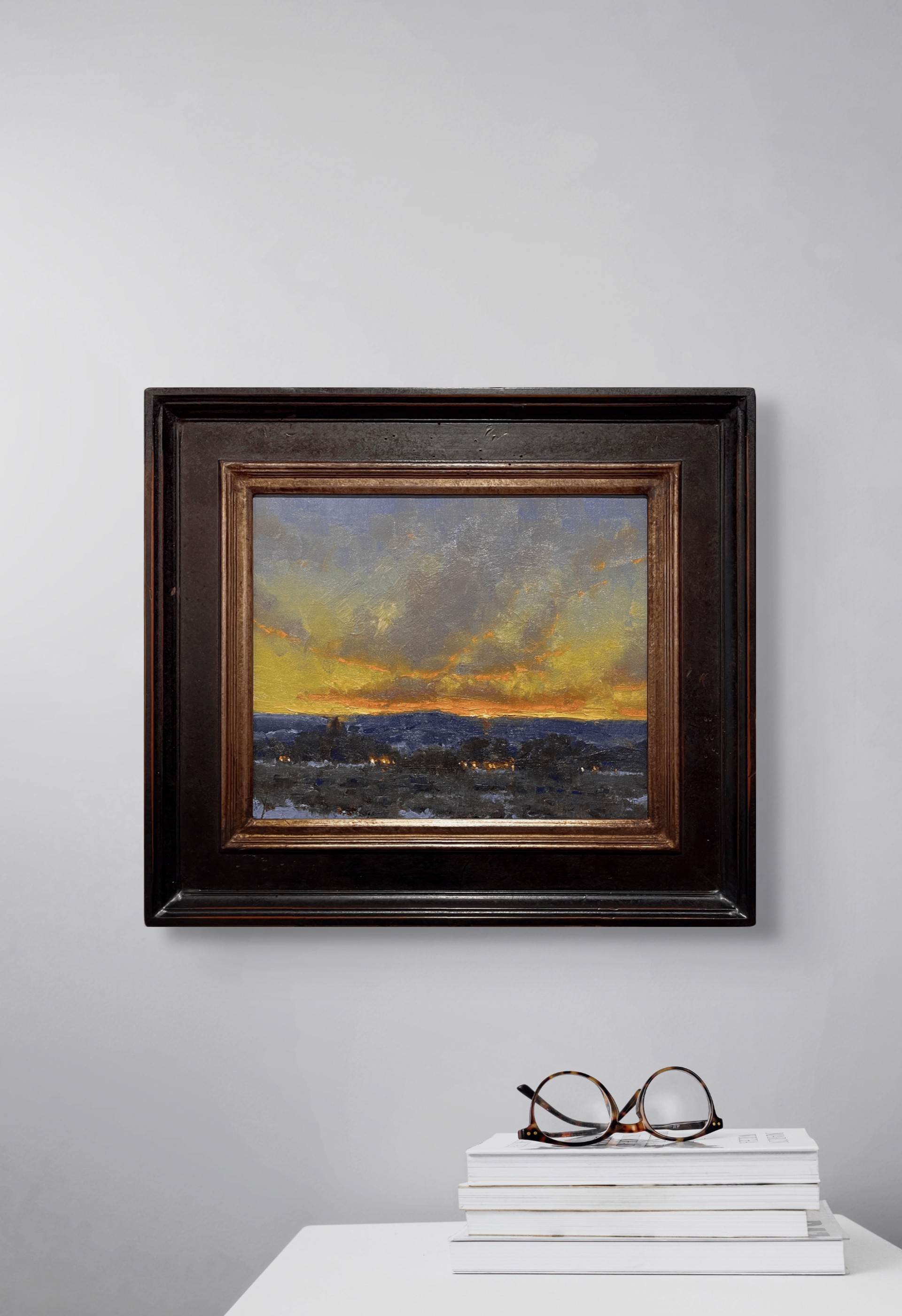 A dramatic landscape painting capturing a twilight sky over a dark, snowy foreground.