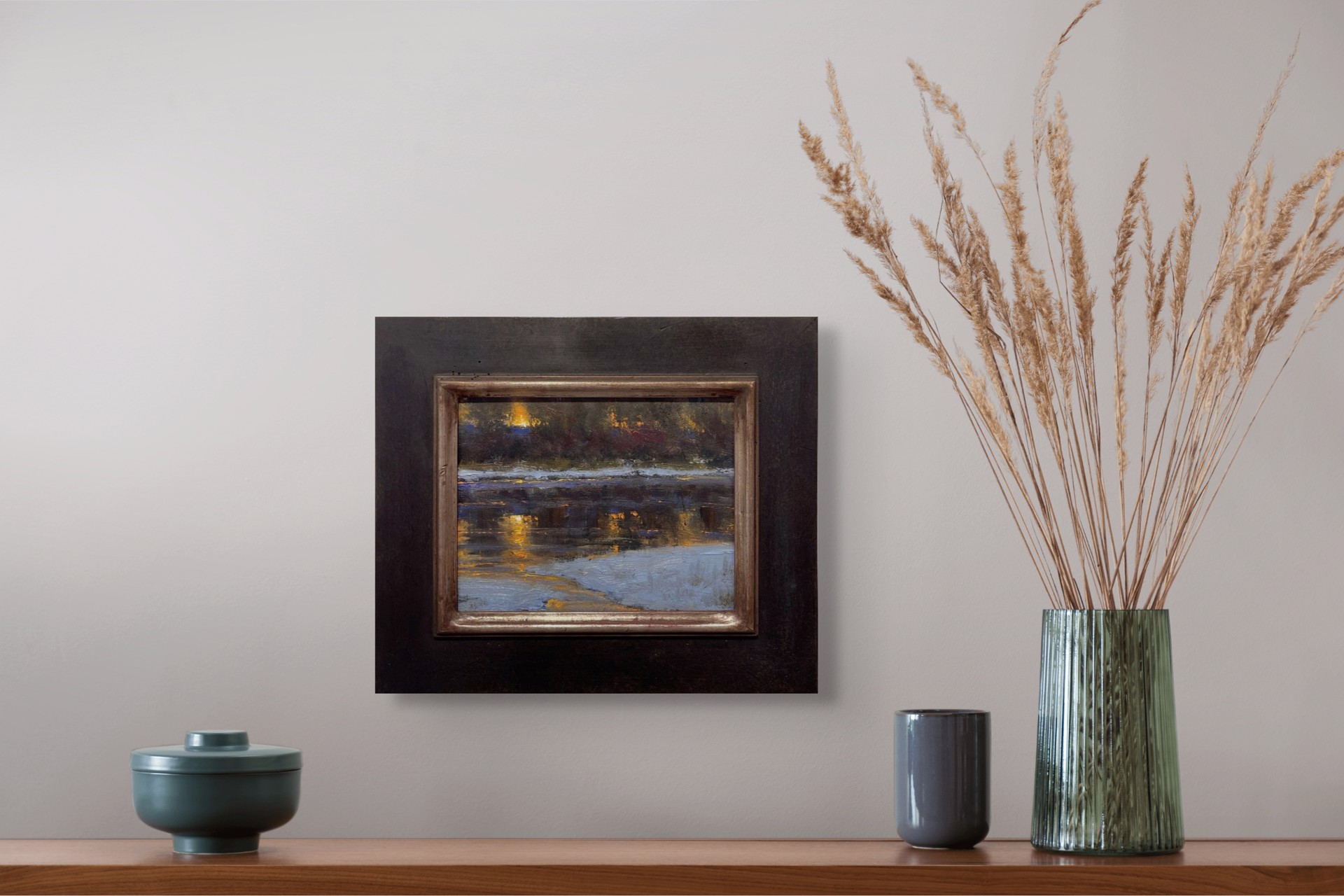A nocturnal landscape painting capturing the shimmering reflections of warm lights on a dark, textured surface.