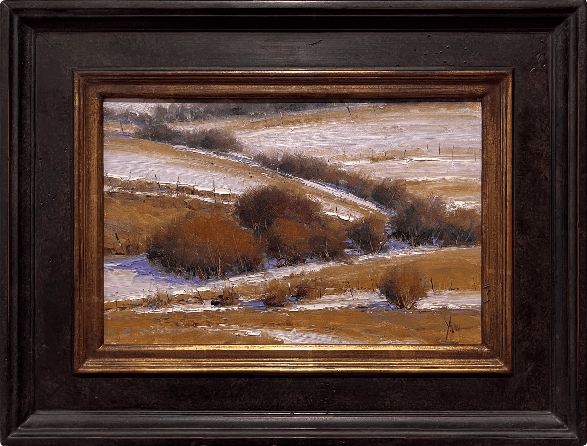 A winter landscape painting featuring snow-covered hills and dark shrubs.