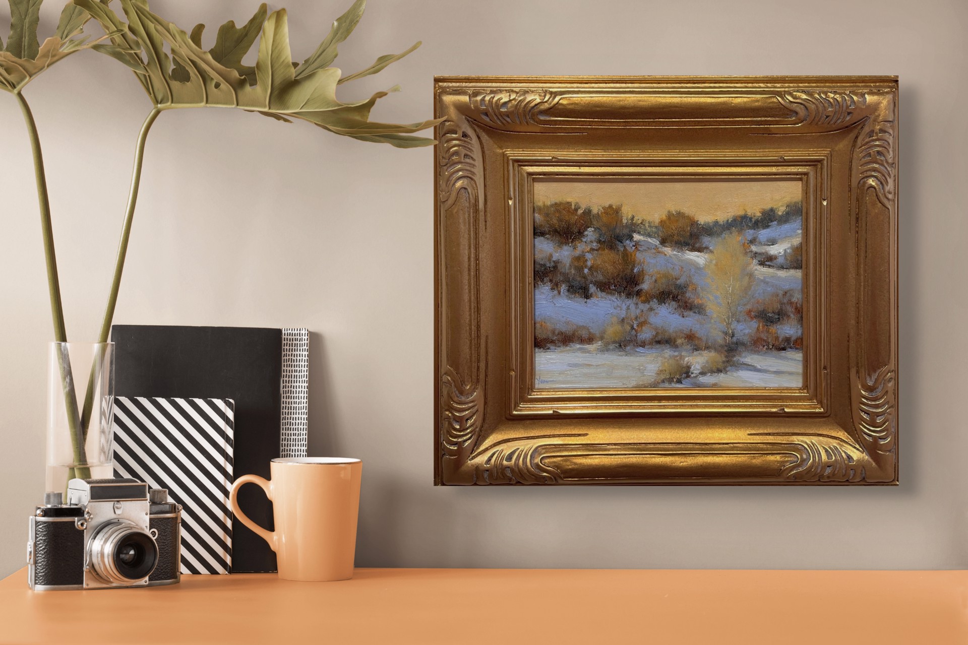 A winter landscape painting capturing a snowy hillside under a warm, golden sky.