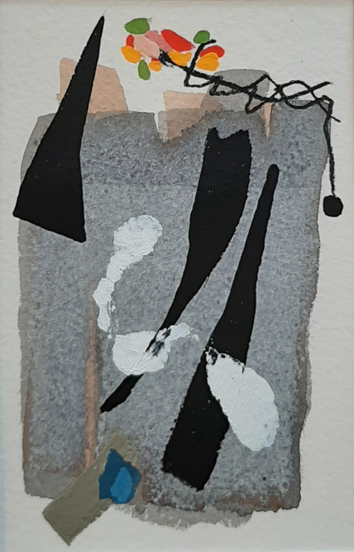 A painting on a piece of paper with black and white paint.