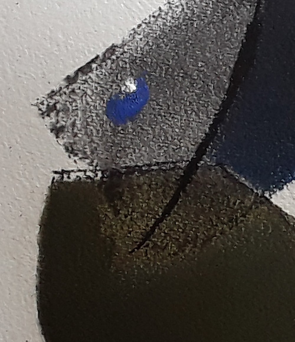 A close up of a painting on a wall.