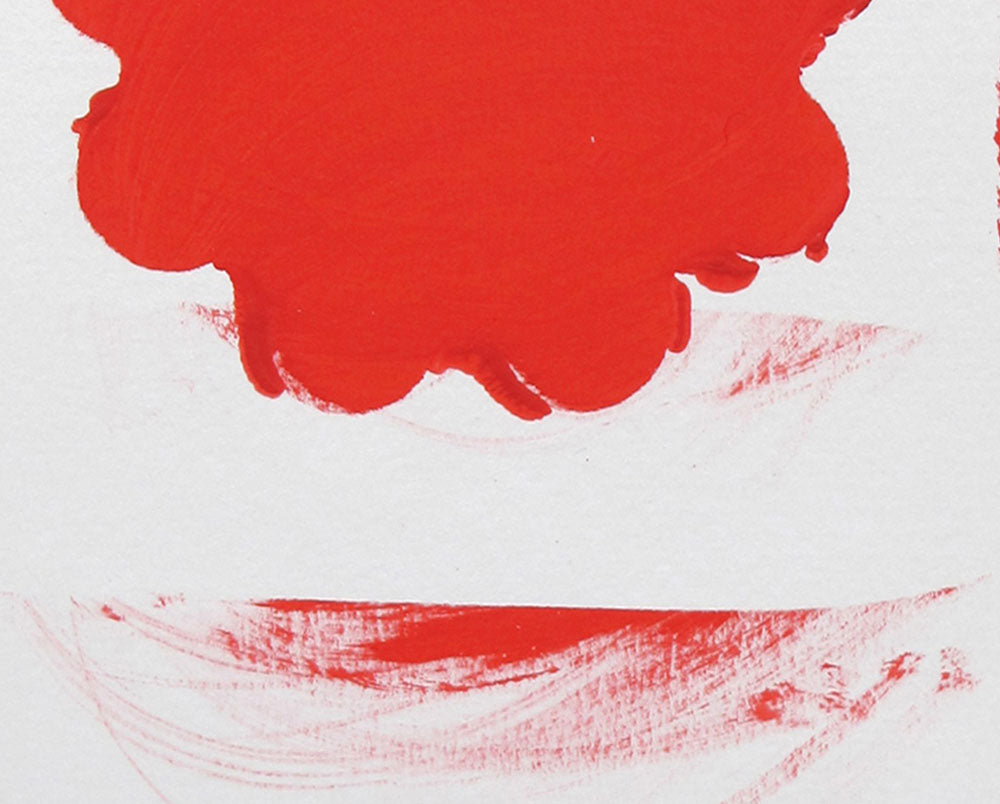 A red and white painting on a white wall.