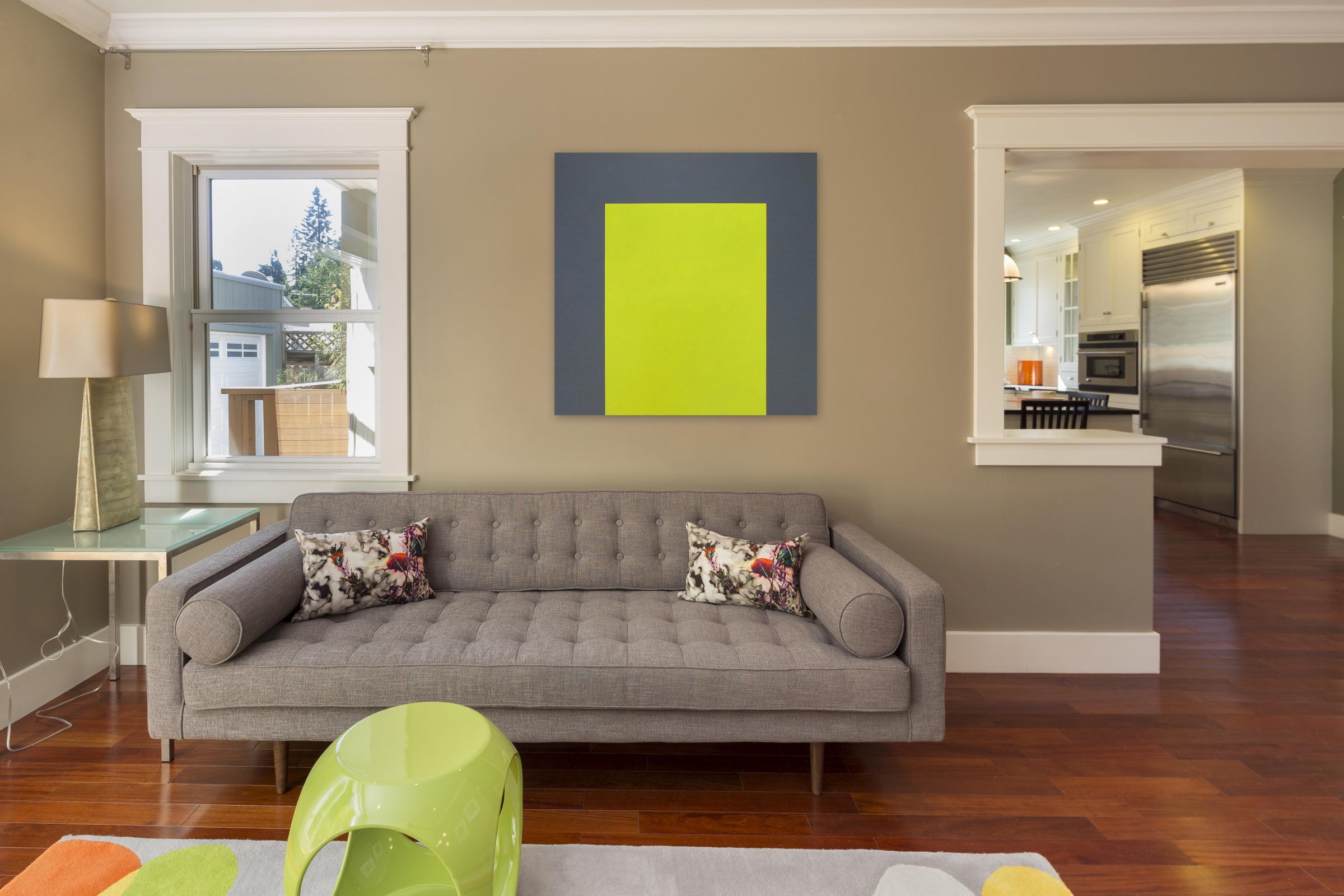 A yellow and gray square on a white background.