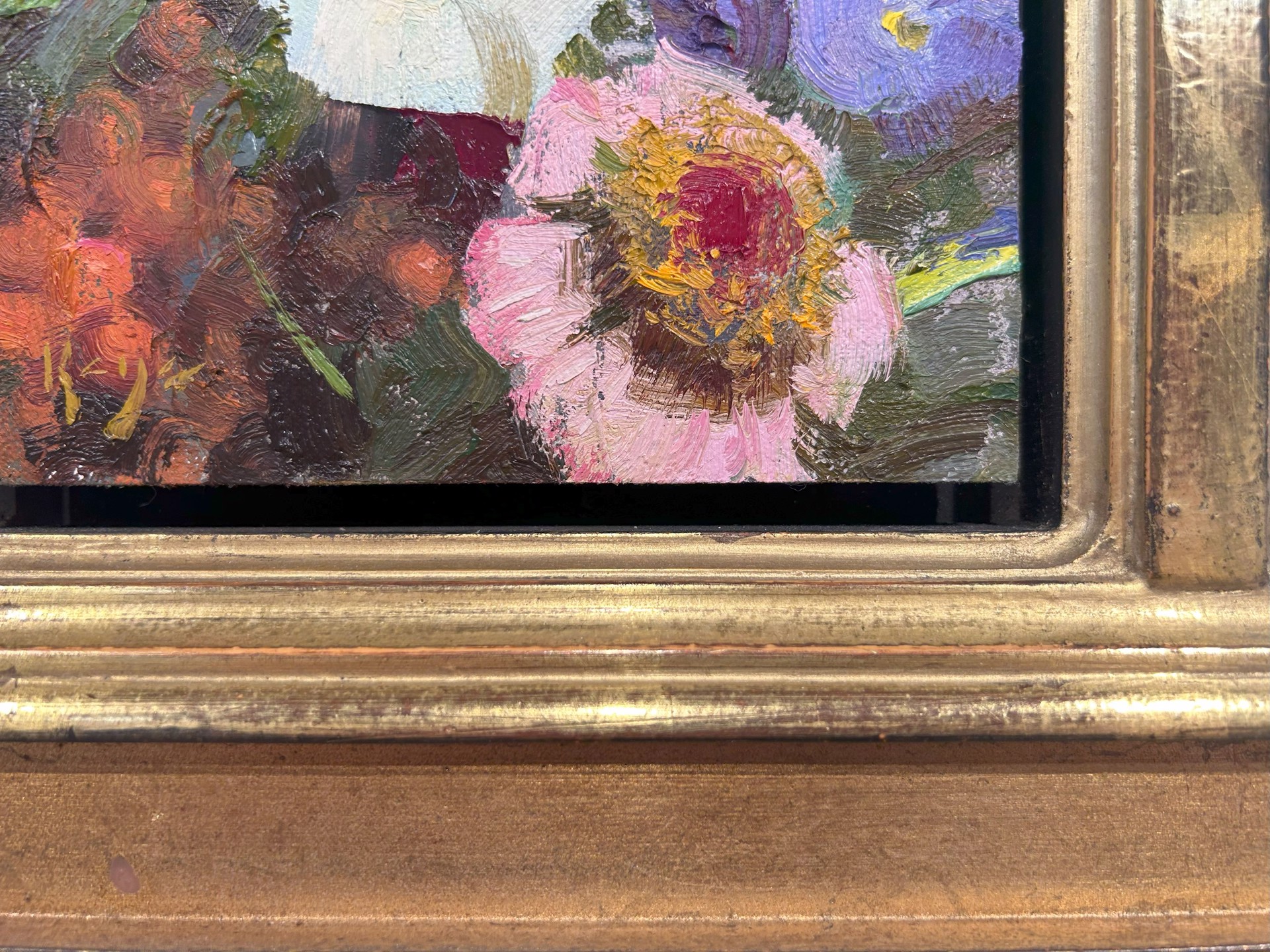A vibrant floral still life featuring bold, textured brushstrokes and a rich palette of reds, purples, yellows, and whites.