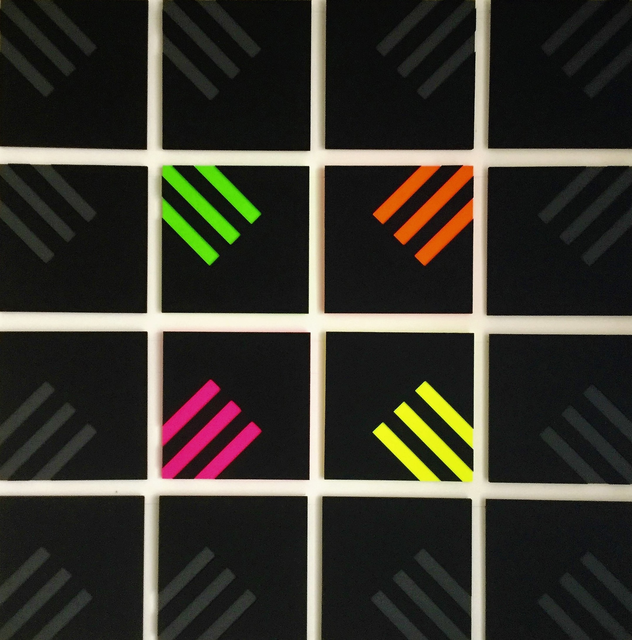 A set of six square stickers with different colored stripes.