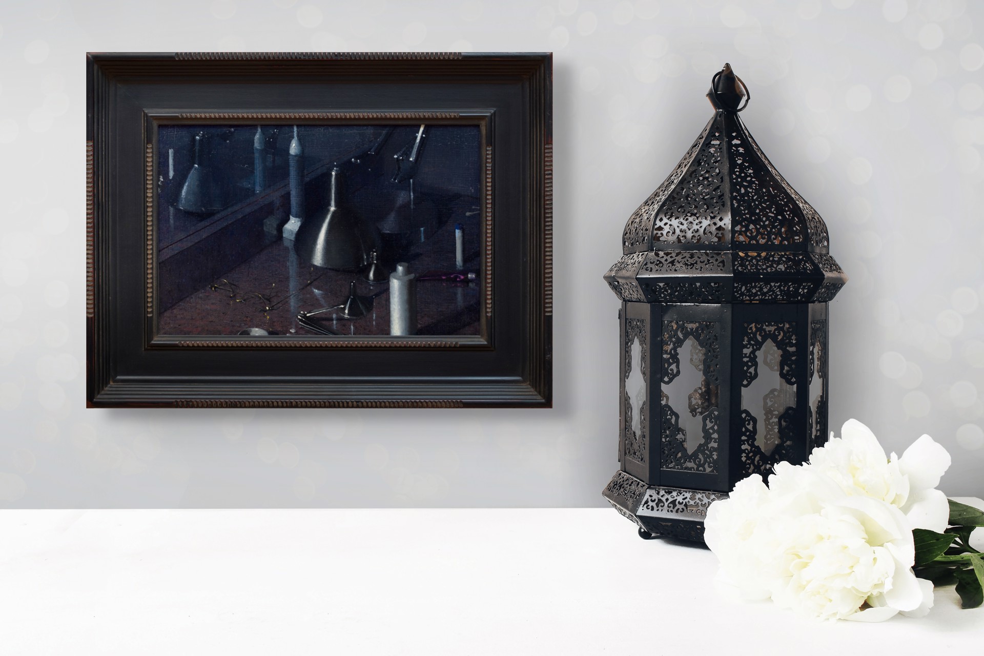 A dark, moody still life featuring metallic funnels and paint tubes on a reflective surface.